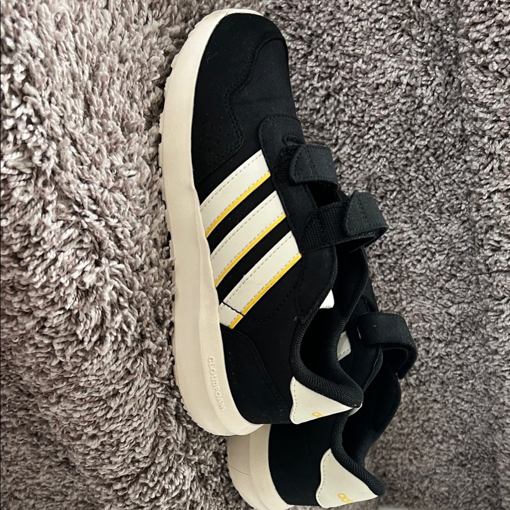 Adidas Kids Black Sneakers with White Stripes and Yellow Highlights